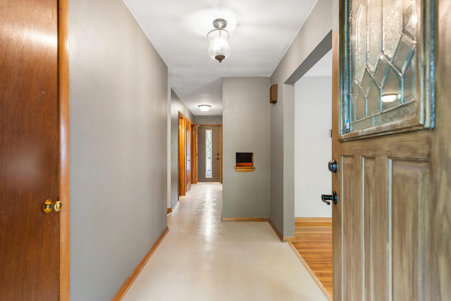1405 Mayfair Road Champaign, IL 61821 - Photo 7 of 34 a view of a hallway with wooden floor