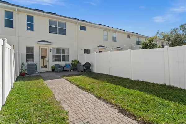 a view of a back yard of the house