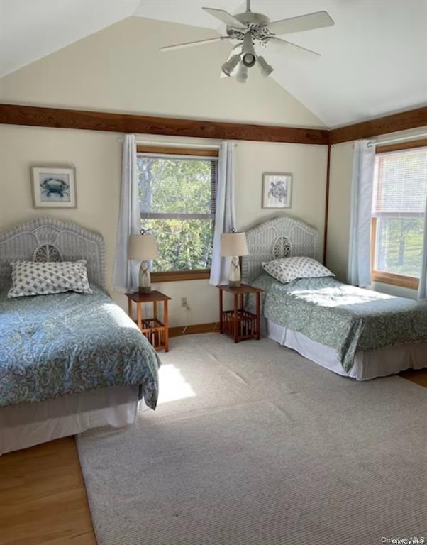 48 Oakhurst Road Hampton Bays, NY 11946 - Photo 20 of 25 a bedroom with a bed and a window