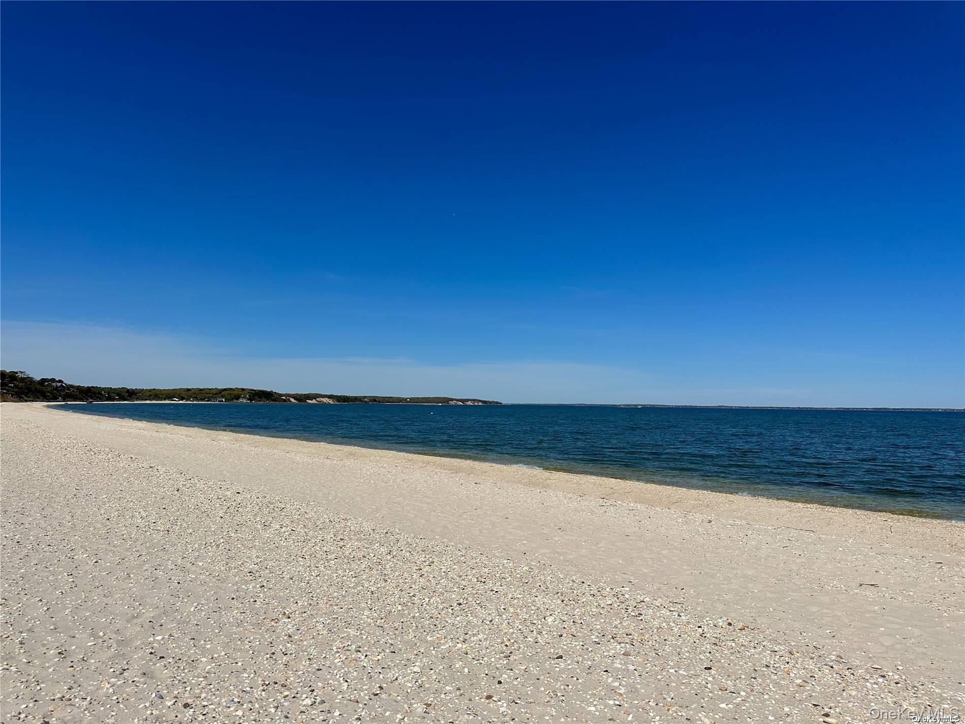 48 Oakhurst Road Hampton Bays, NY 11946 - Photo 2 of 25 a view of an ocean and beach