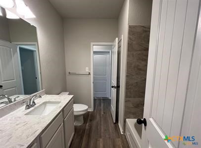 978 Aurora Grv Bend Temple, TX 76502 - Photo 8 of 10 a bathroom with a granite countertop sink toilet and shower