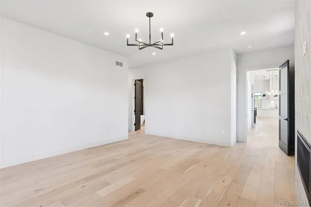 a view of an empty room with windows