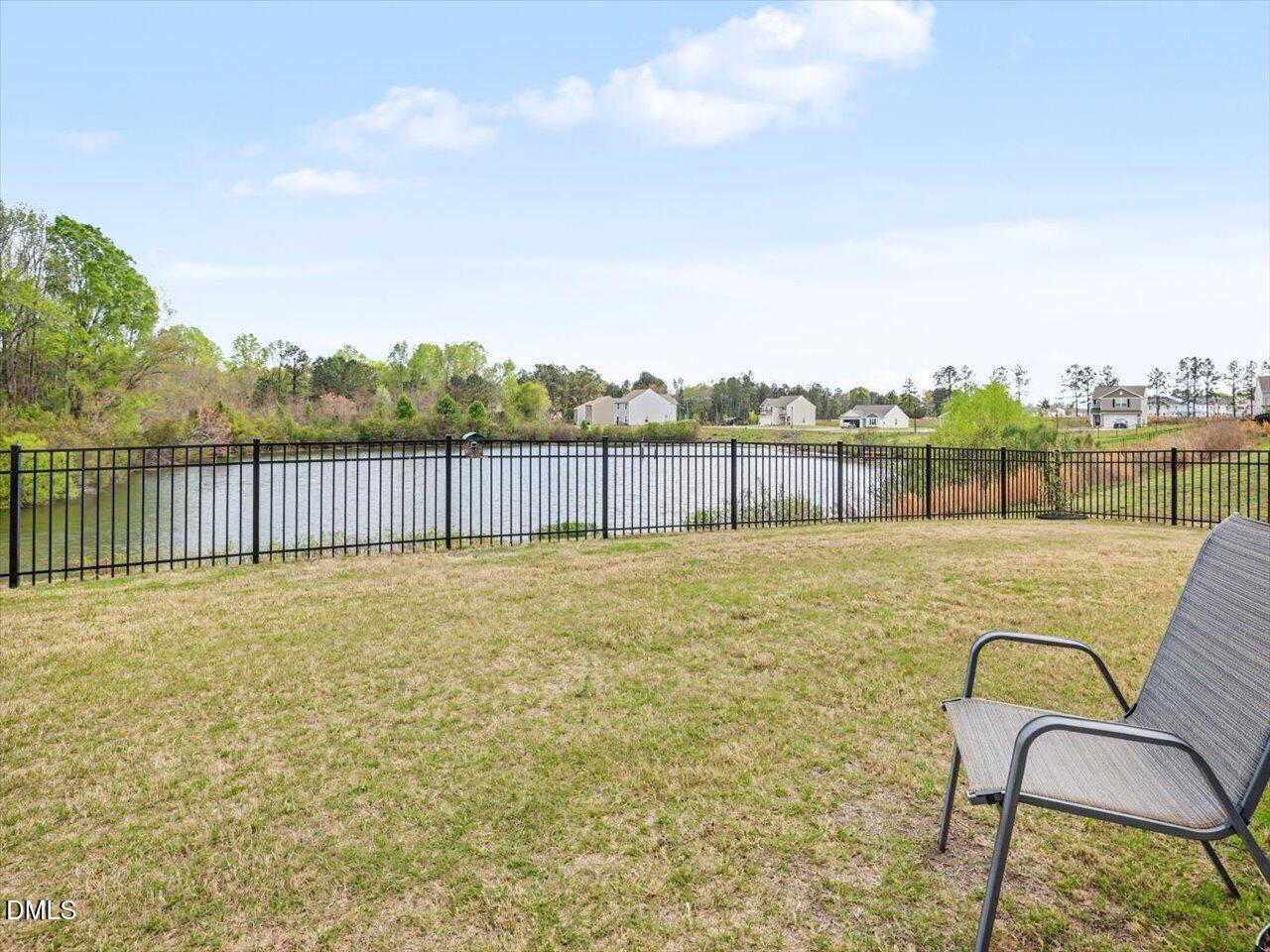 90 Barnsley Road Angier, NC 27501 - Photo 32 of 40 a view of a swimming pool with a lounge chair