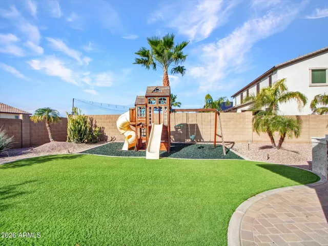 a bathroom with a sink double vanity and a mirror