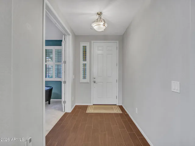 a view of a workspace with furniture