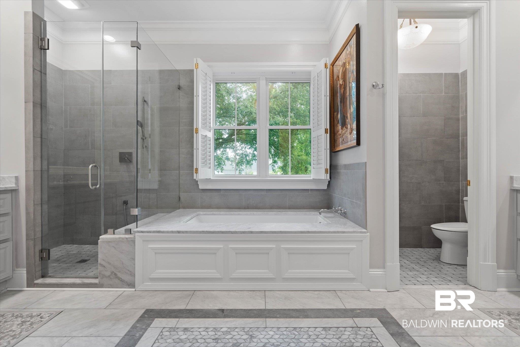 4008 McGregor Oaks Mobile, AL 36608 - Photo 23 of 50 Bathroom featuring a bath, ornamental molding, and a shower stall