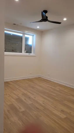 a bathroom with a double vanity sink and mirror