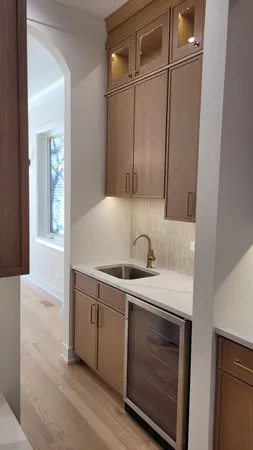 a view of a kitchen with a sink