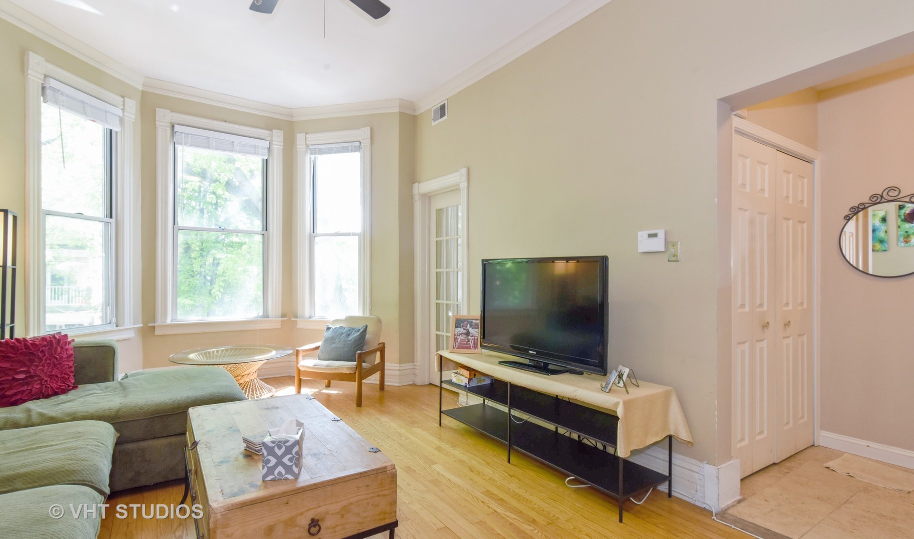 1424 West Fletcher Street Chicago, IL 60657 - Photo 2 of 24 a living room with furniture and a flat screen tv