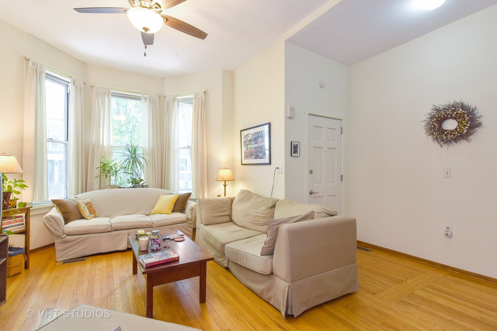 1424 West Fletcher Street Chicago, IL 60657 - Photo 14 of 24 a living room with furniture and a large window