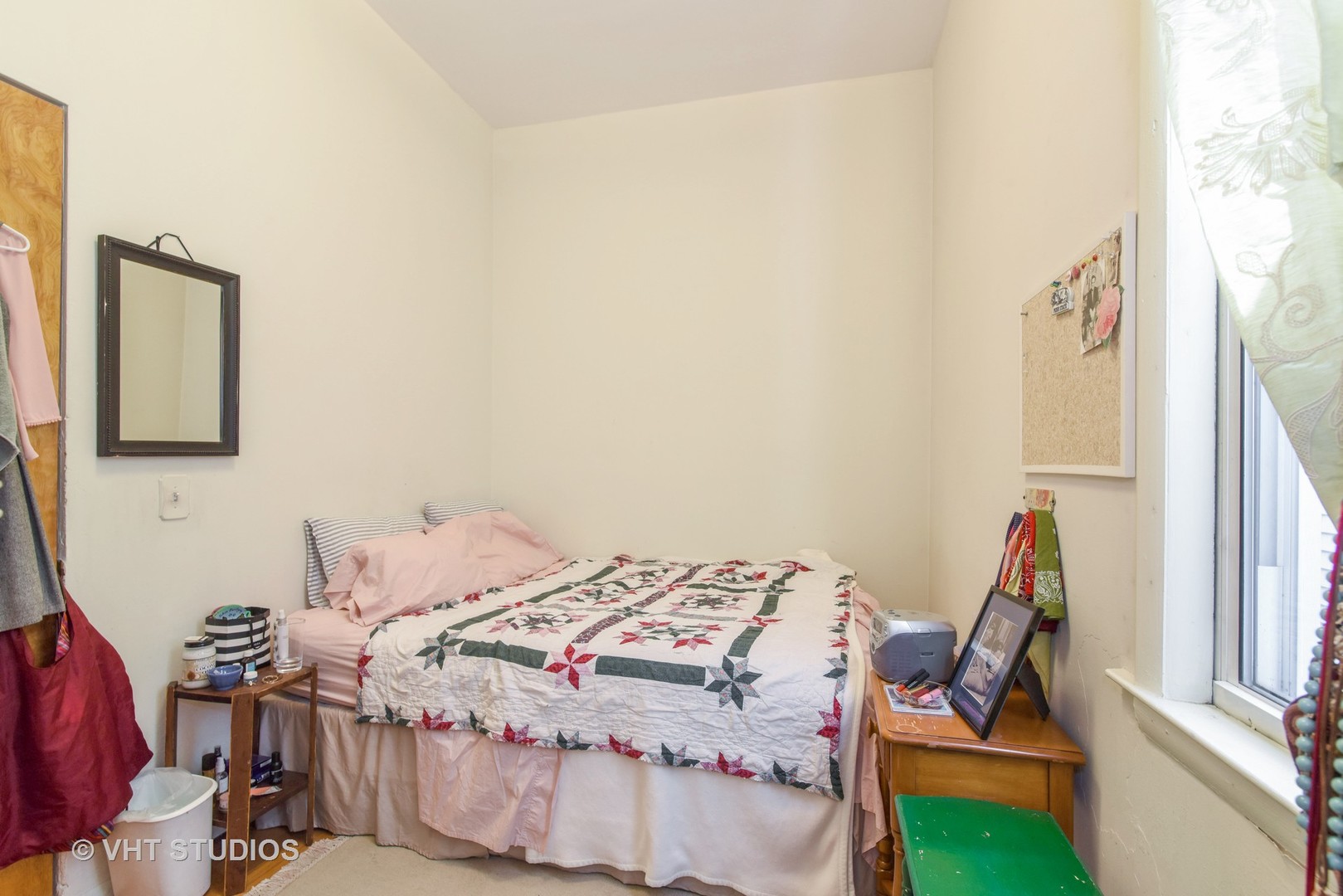 1424 West Fletcher Street Chicago, IL 60657 - Photo 16 of 24 a bedroom with a bed and a window