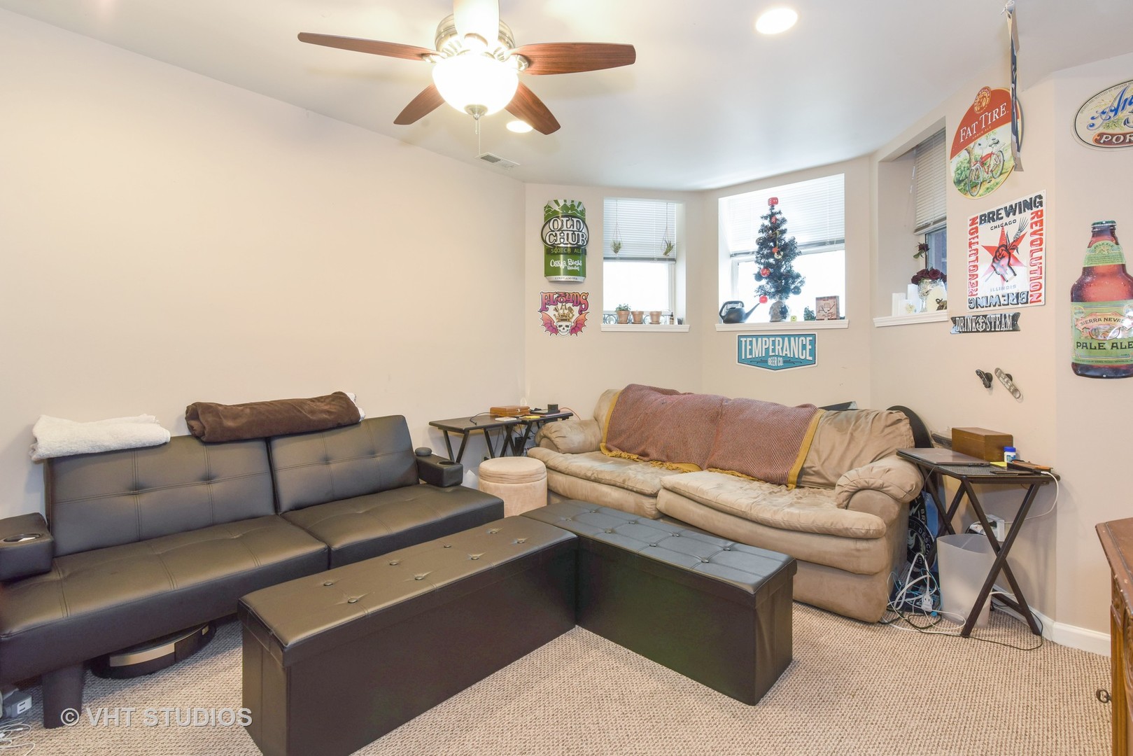 1424 West Fletcher Street Chicago, IL 60657 - Photo 18 of 24 a living room with furniture and a flat screen tv