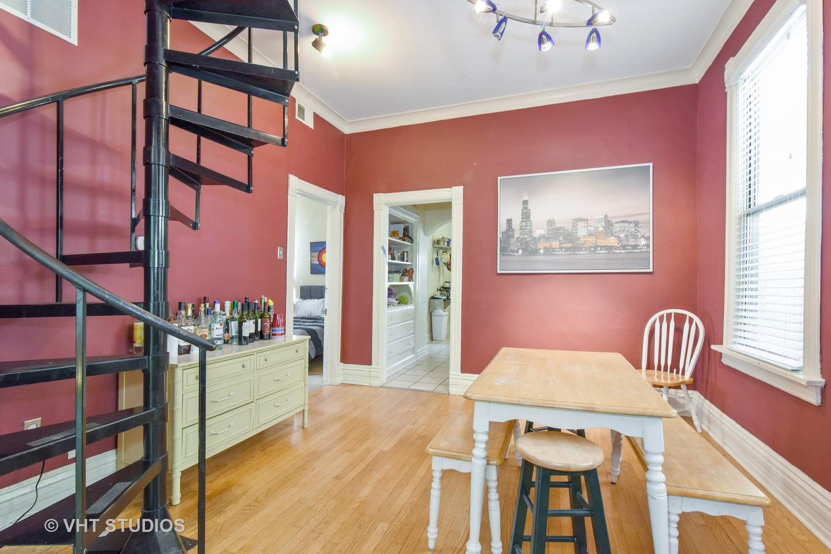 1424 West Fletcher Street Chicago, IL 60657 - Photo 6 of 24 a view of a dining room with furniture and a window