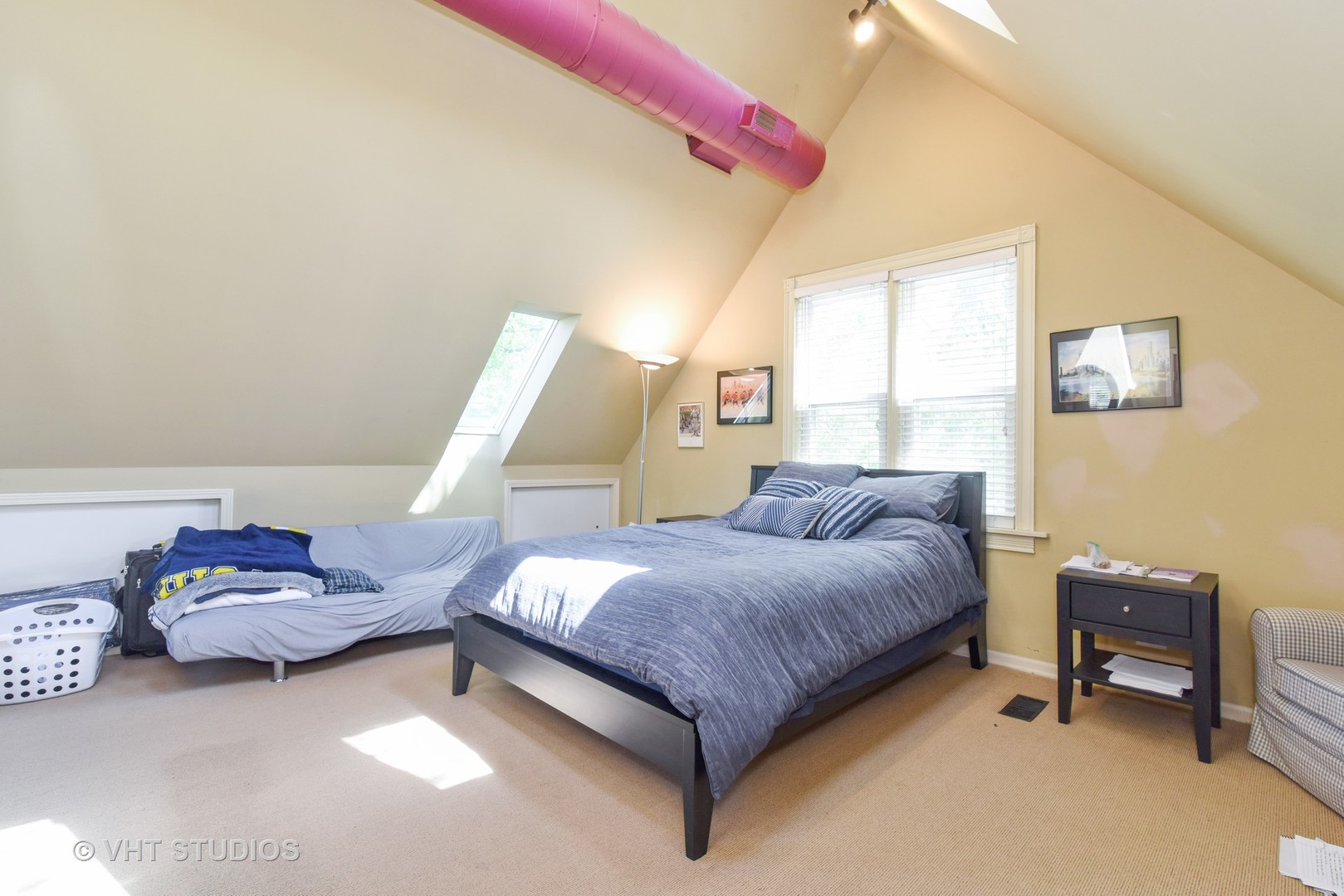 1424 West Fletcher Street Chicago, IL 60657 - Photo 7 of 24 a bedroom with a bed and window