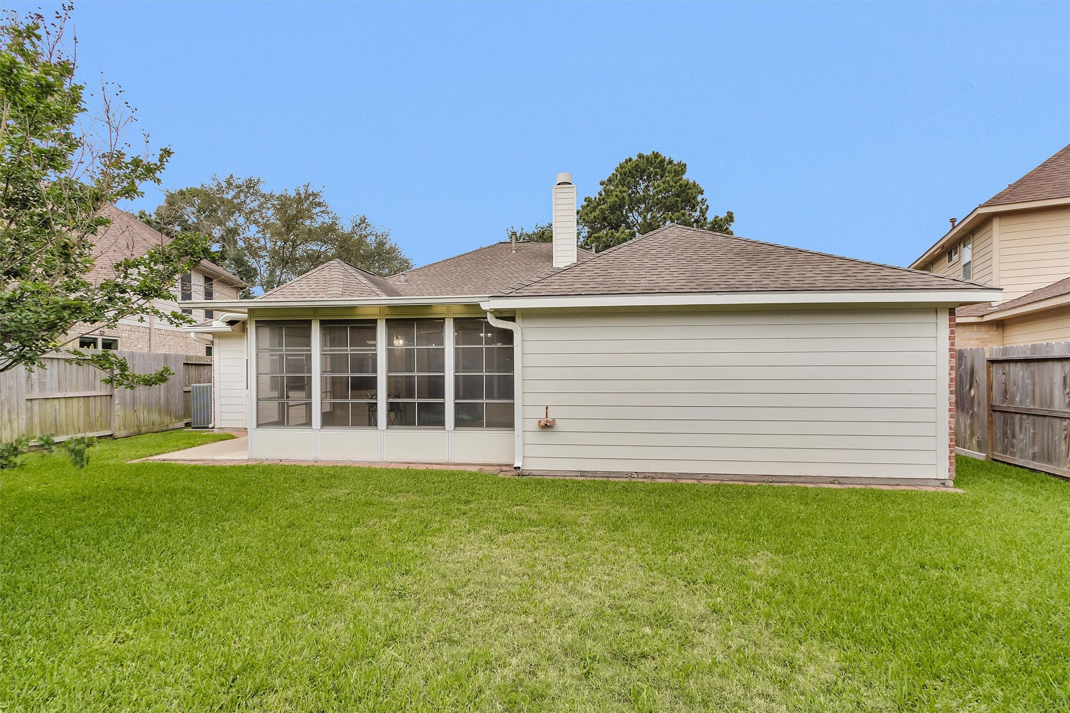 6031 Skyhaven Lane Spring, TX 77379 - Photo 31 of 33 Large area of grass gives the pets plenty of room.