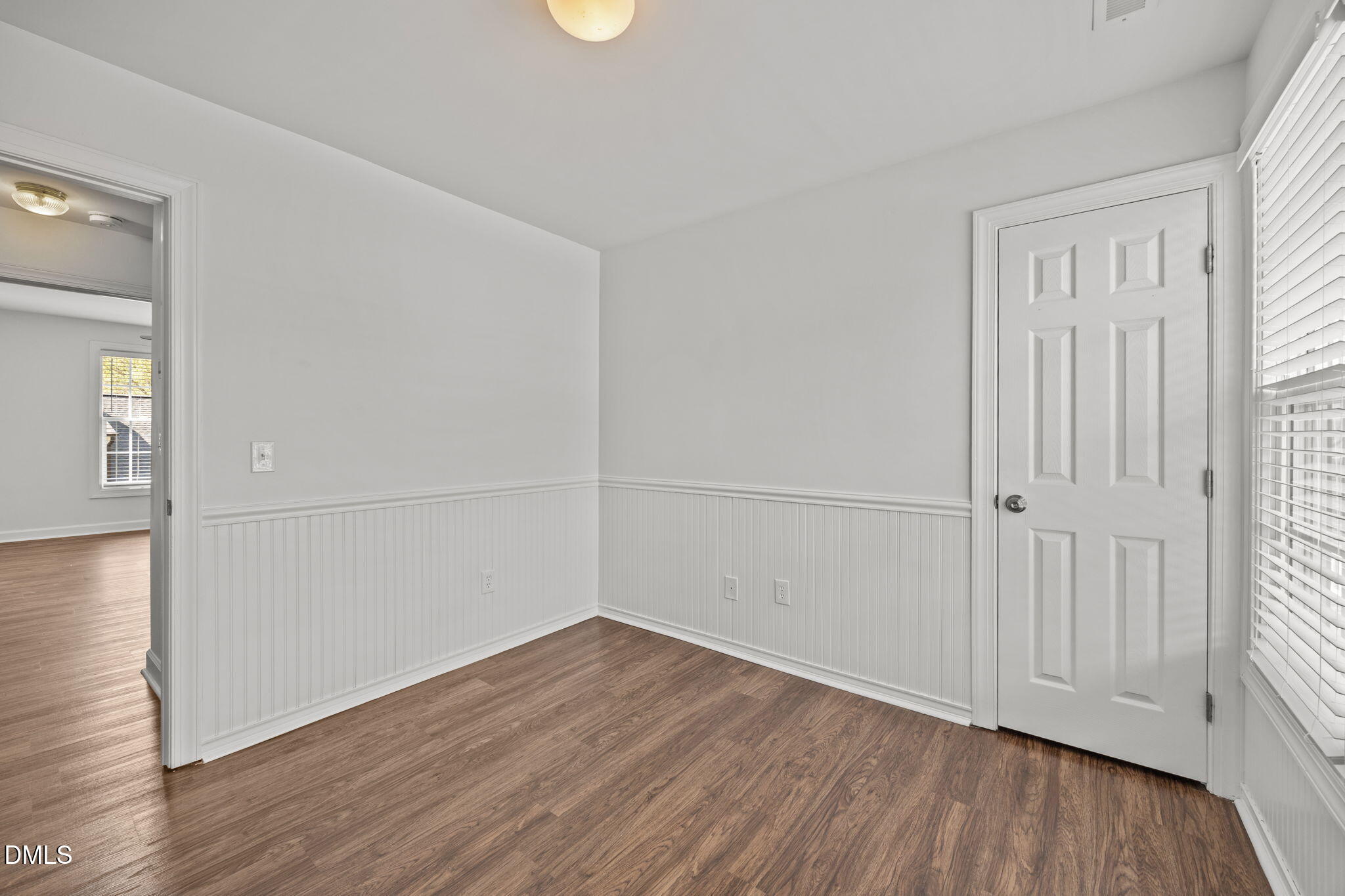 9220 Pennythorne Court Raleigh, NC 27615 - Photo 23 of 49 an empty room with wooden floor