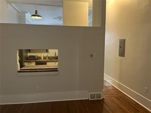 1327 Liverpool Street, Unit 1 Pittsburgh, PA 15233 - Photo 15 of 24 a view of a hallway with wooden floor