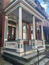 1327 Liverpool Street, Unit 1 Pittsburgh, PA 15233 - Photo 2 of 24 front view of a house with a porch