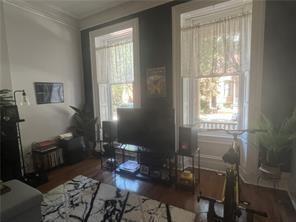 1327 Liverpool Street, Unit 1 Pittsburgh, PA 15233 - Photo 7 of 24 a room with furniture and a window