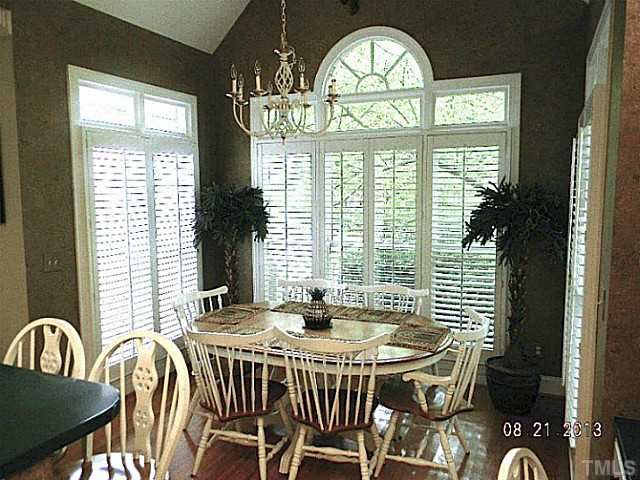 5205 Deergrass Court Raleigh, NC 27613 - Photo 12 of 25 A Cathedral ceiling greets you in the morning as you sit to have your coffee and read the day's news. Breakfast Area