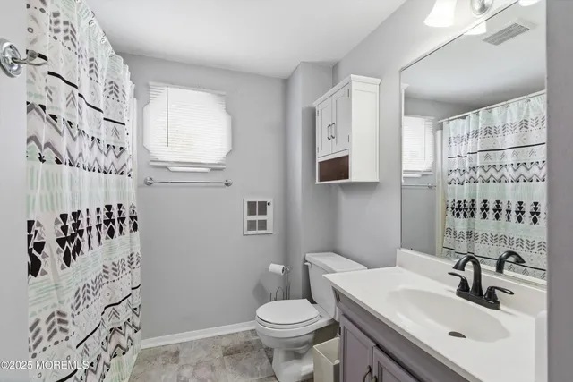 a view of house with chair and tables