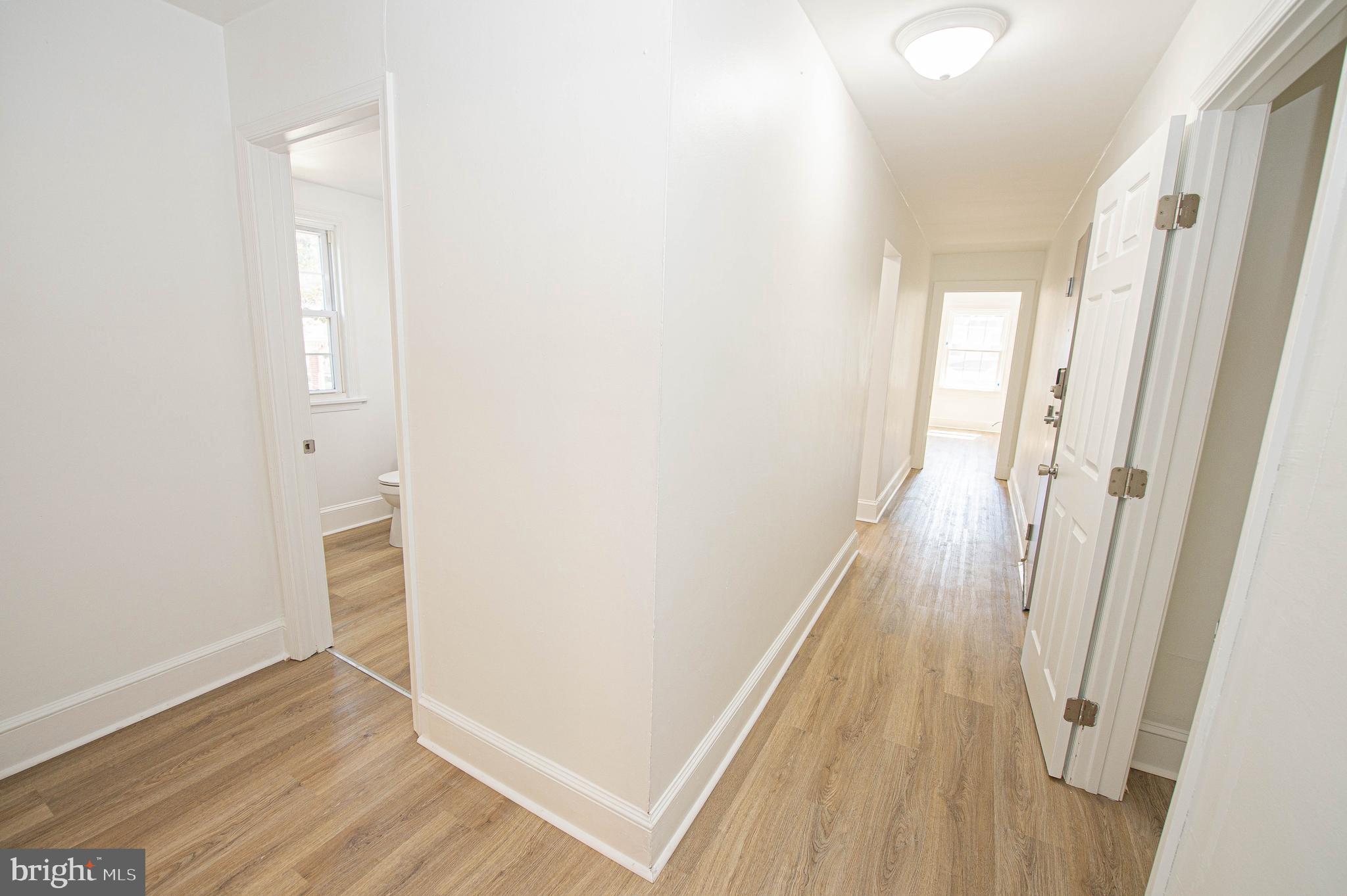 308 North Division Street, Unit 12 Salisbury, MD 21801 - Photo 25 of 42 an entryway of a house with wooden floor