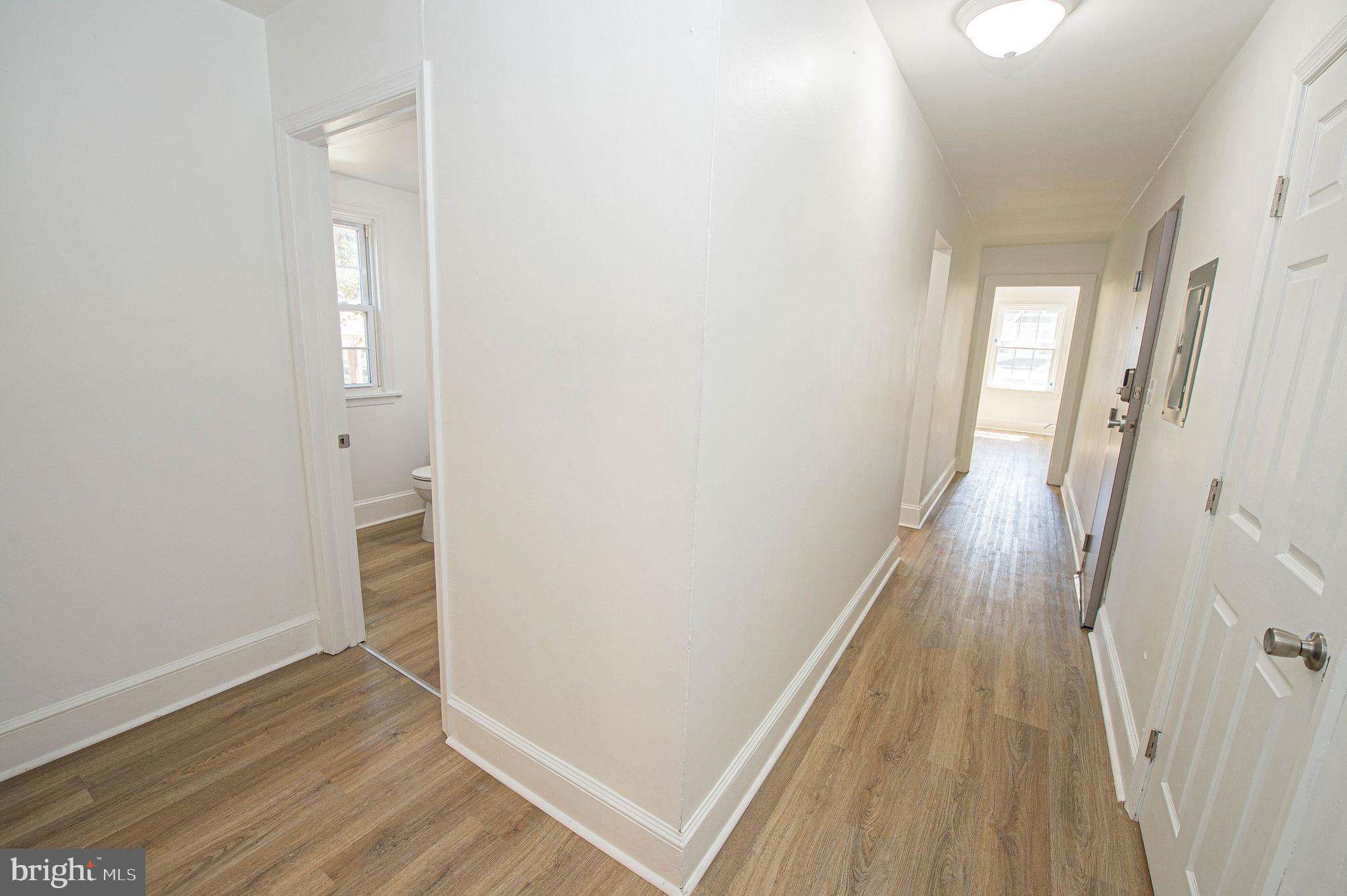 308 North Division Street, Unit 12 Salisbury, MD 21801 - Photo 32 of 42 wooden floor in a gallery
