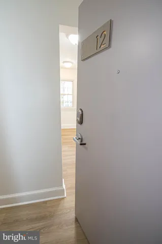 a view of a livingroom with wooden floor