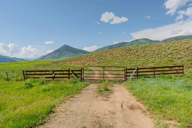 a view of a lake with a building in the background
