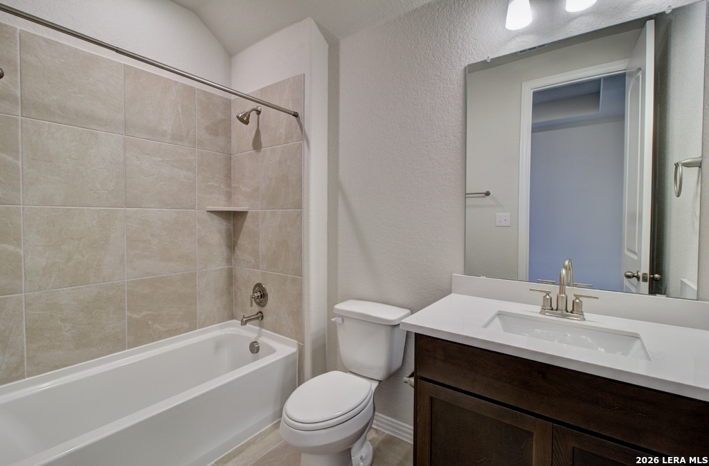 2133 Shepards Street Seguin, TX 78155 - Photo 17 of 21 a bathroom with a sink a toilet and shower