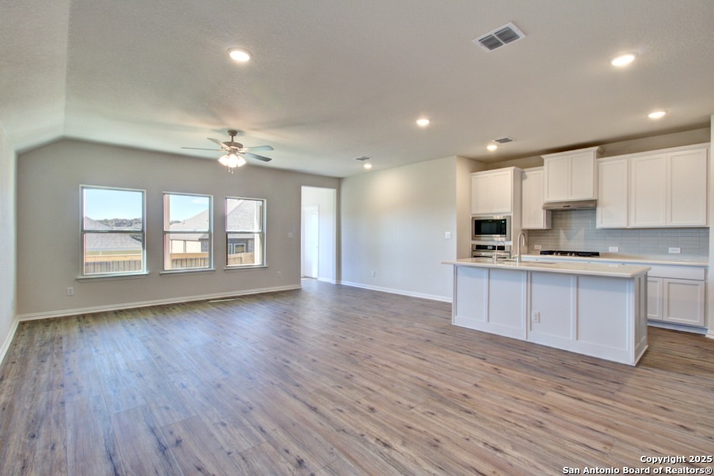 2133 Shepards Street Seguin, TX 78155 - Photo 7 of 22 a view of kitchen with sink and wooden floor
