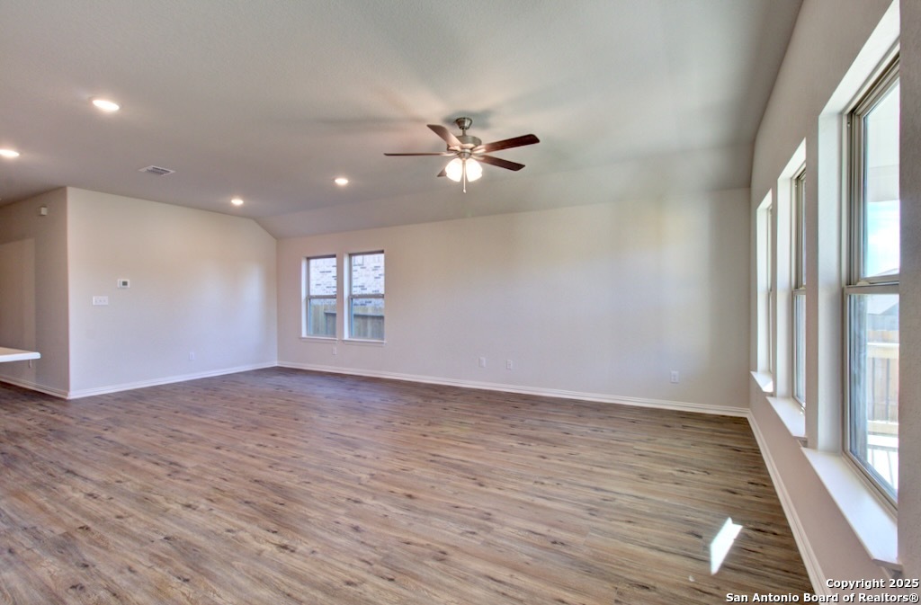 2133 Shepards Street Seguin, TX 78155 - Photo 9 of 22 wooden floor in an empty room with a window