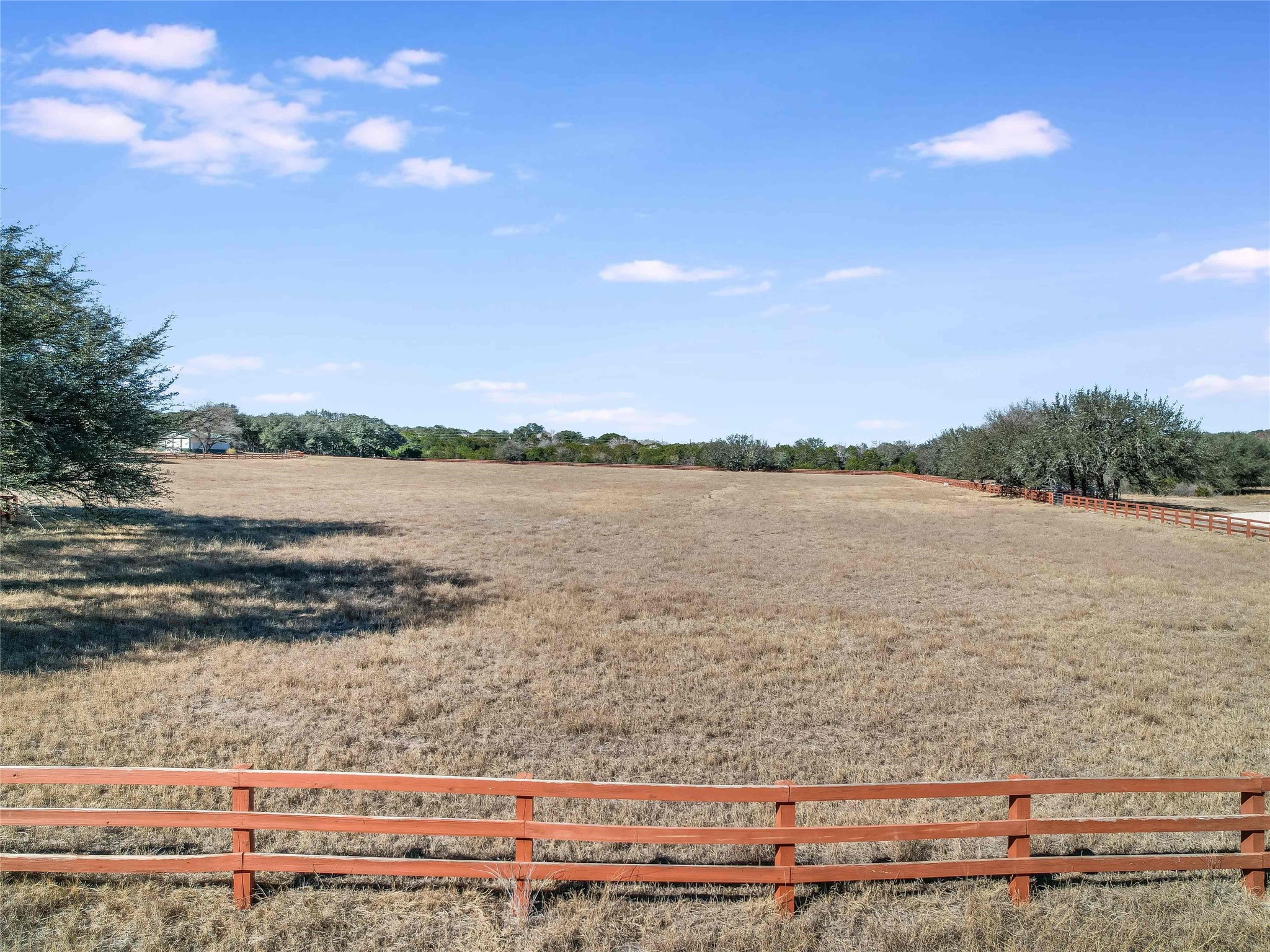 25909 Hamilton Pool Road Round Mountain, TX 78663 - Photo 29 of 34 a view of a lake with a city view