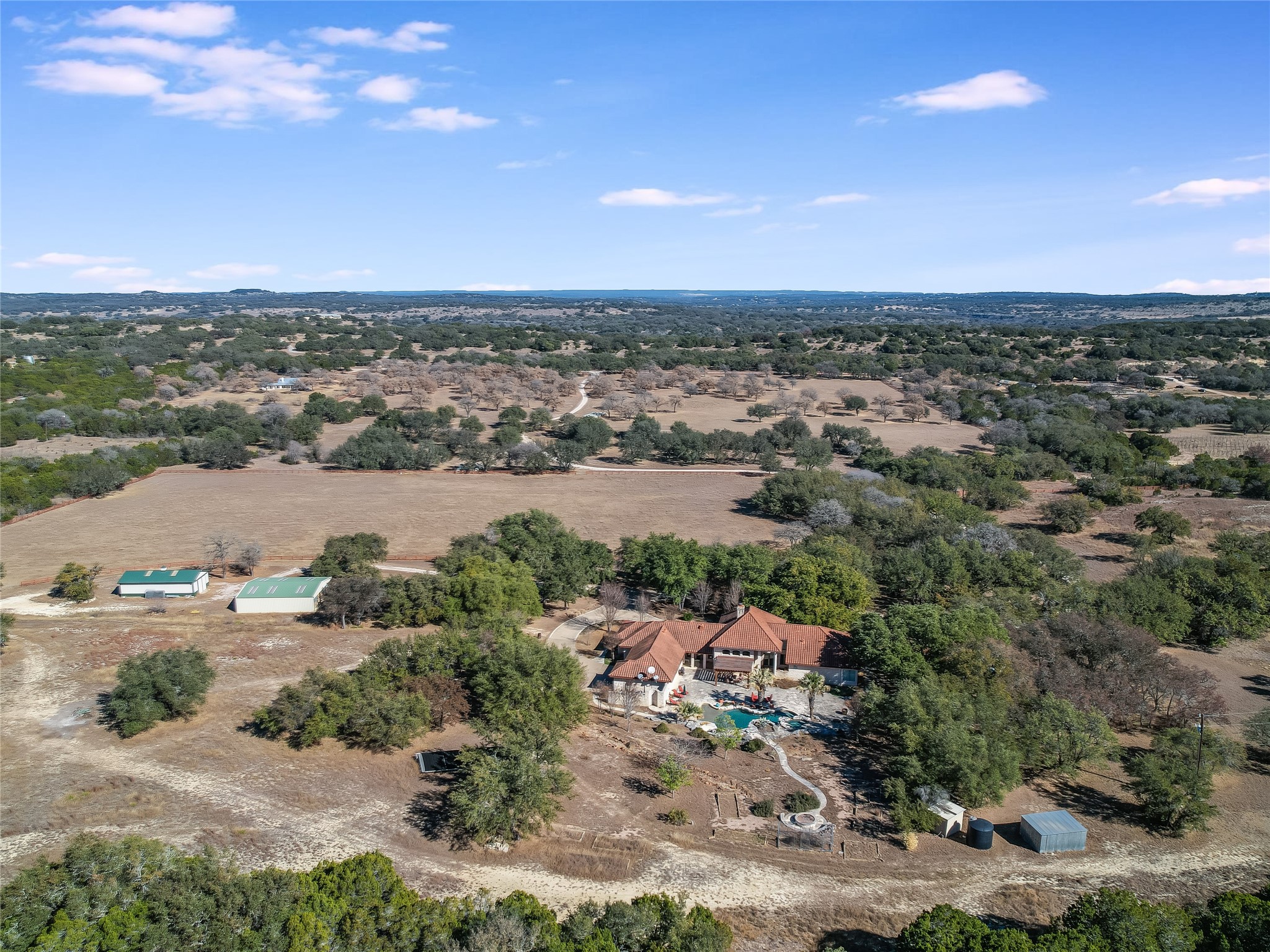 25909 Hamilton Pool Road Round Mountain, TX 78663 - Photo 32 of 34 an aerial view of a city