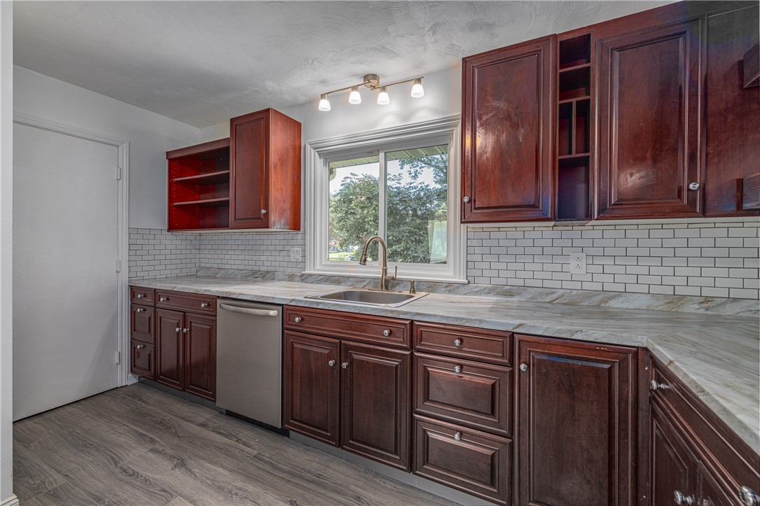 224 Brookview Drive Irondequoit, NY 14617 - Photo 18 of 46 NEWER CUSTOM KITCHEN WITH BEAUTIFUL CABINETRY & ST