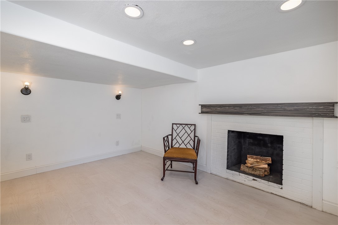 224 Brookview Drive Irondequoit, NY 14617 - Photo 26 of 46 LOWER LEVEL FIREPLACE LIVING ROOM - POTENTIAL IN-