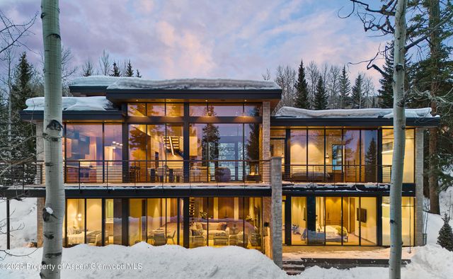 a view of building with a lot of windows and entertaining space