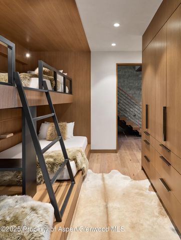 a view of a hallway with seating area