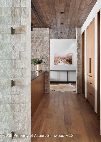 a view of a bathroom with a bathtub and a shower