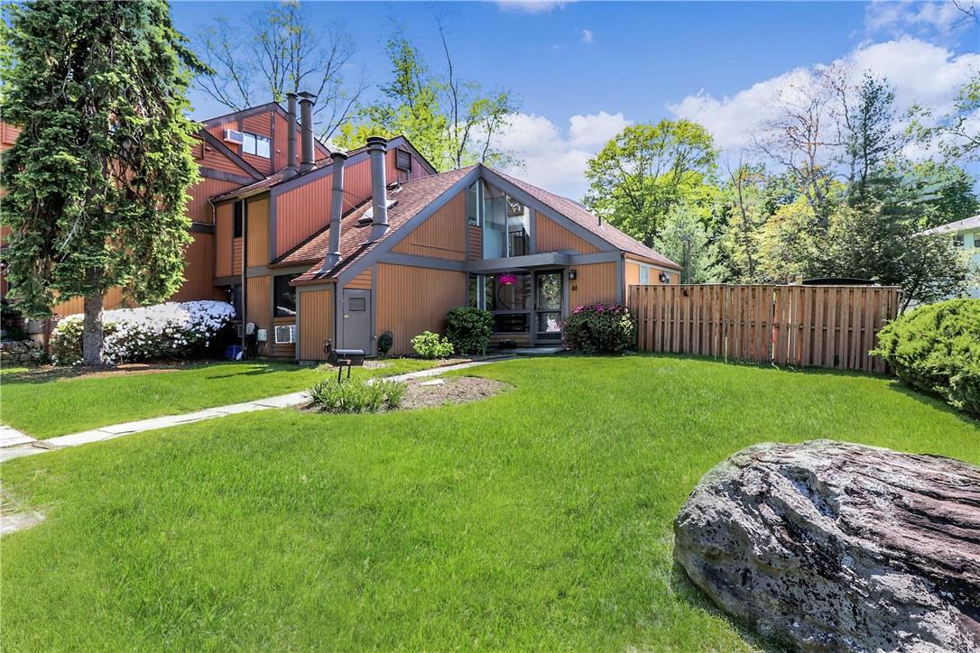61 Round Hill Road Dobbs Ferry, NY 10522 - Photo 1 of 1 a view of a house with a yard and tree s