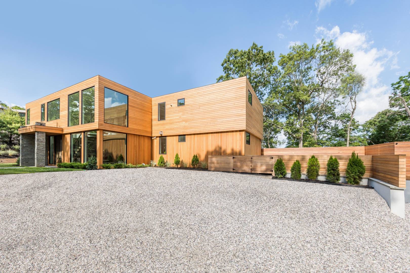 309 Noyack Road Southampton, NY 11968 - Photo 2 of 26 a view of a house with a outdoor space