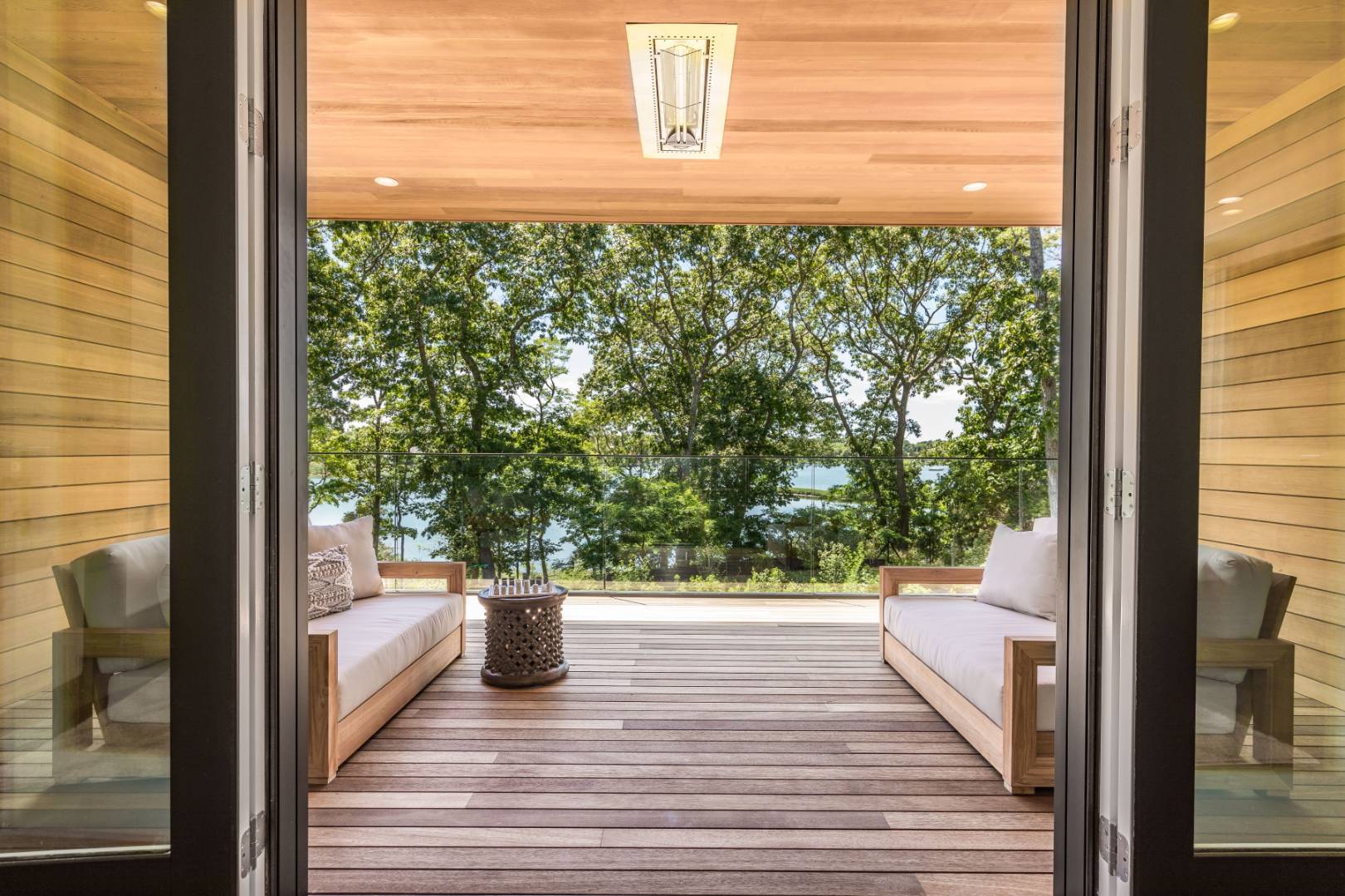 309 Noyack Road Southampton, NY 11968 - Photo 12 of 26 a view of a balcony with wooden floor