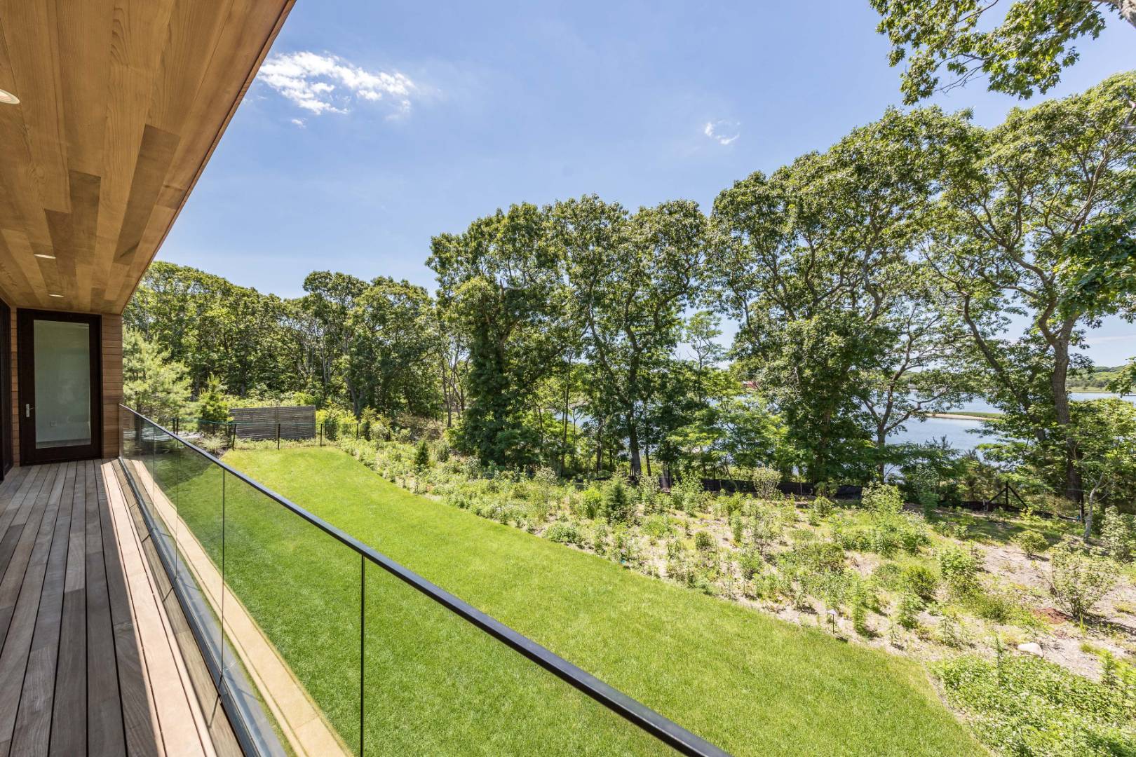 309 Noyack Road Southampton, NY 11968 - Photo 15 of 26 a view of a balcony with yard