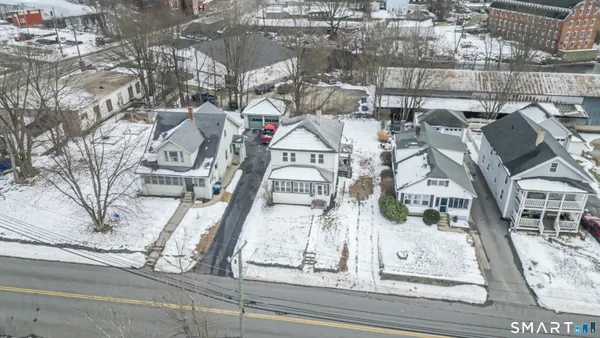 an aerial view of a multi story residential apartment building