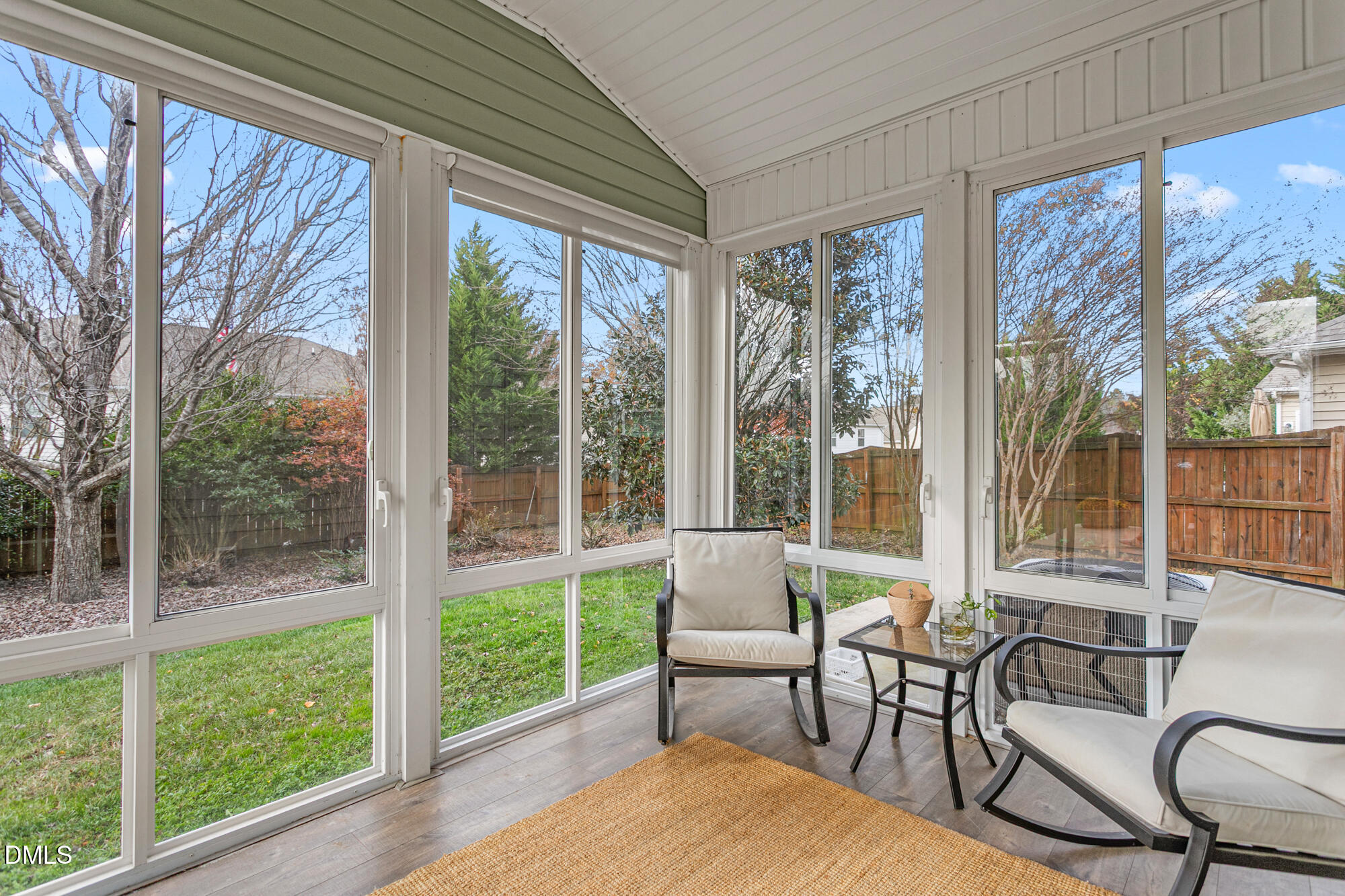 304 Green Pasture Road Mebane, NC 27302 - Photo 14 of 35 a living room with furniture and a floor to ceiling window