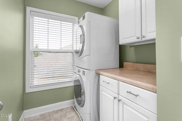 a house with garden in front of it