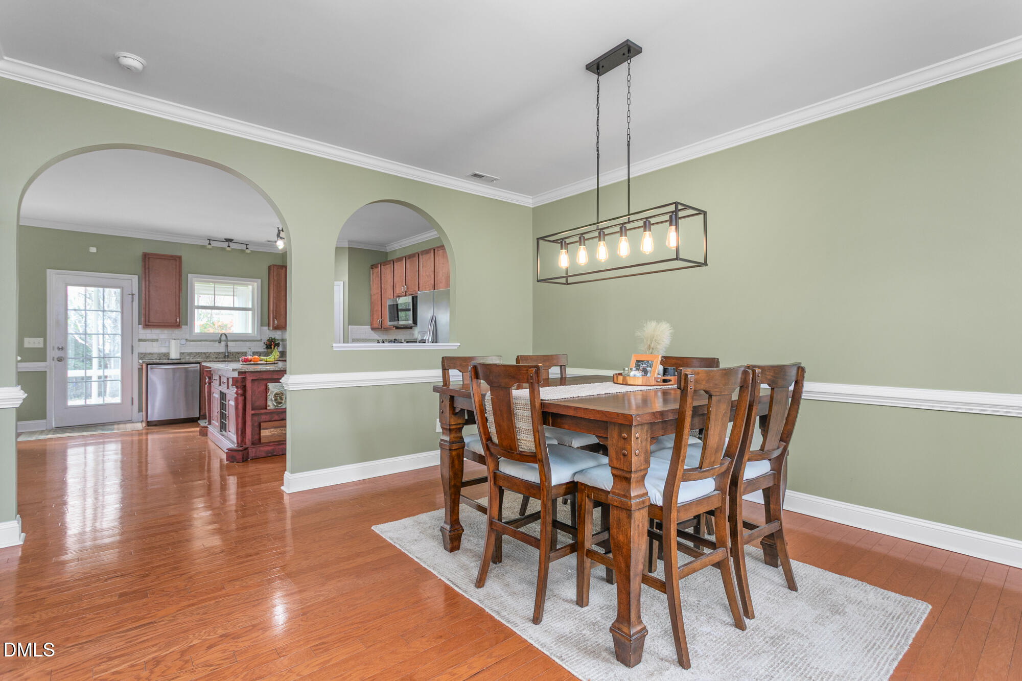 304 Green Pasture Road Mebane, NC 27302 - Photo 4 of 35 a view of a dining room with furniture window and wooden floor