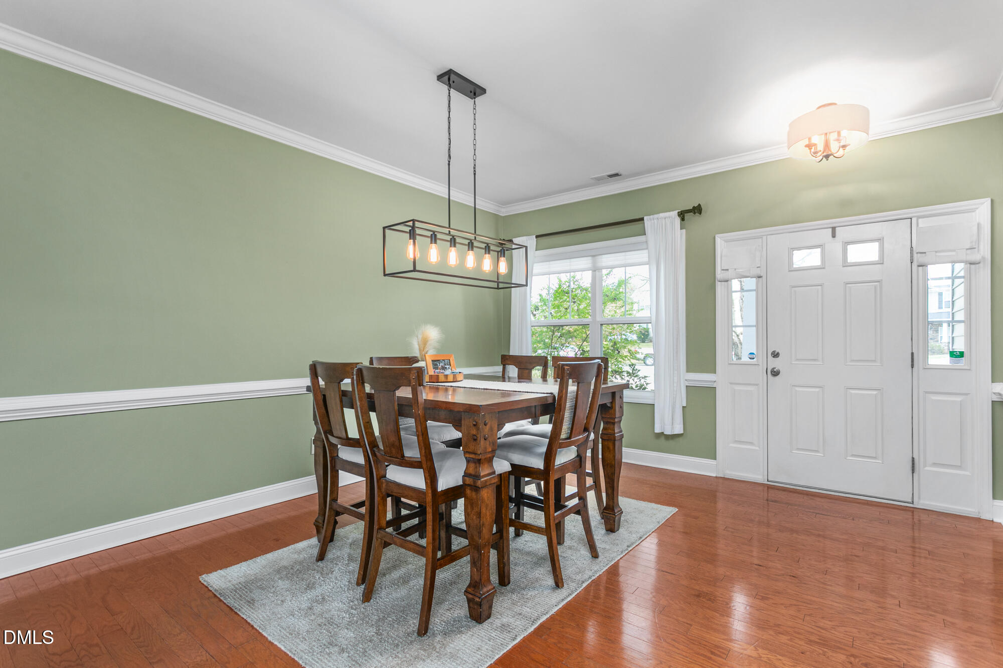 304 Green Pasture Road Mebane, NC 27302 - Photo 5 of 35 a view of a dining room with furniture window and wooden floor