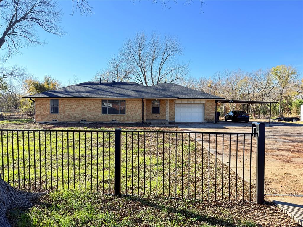 425 Chesier Road Lancaster, TX 75146 - Photo 1 of 15 a front view of a house with a balcony