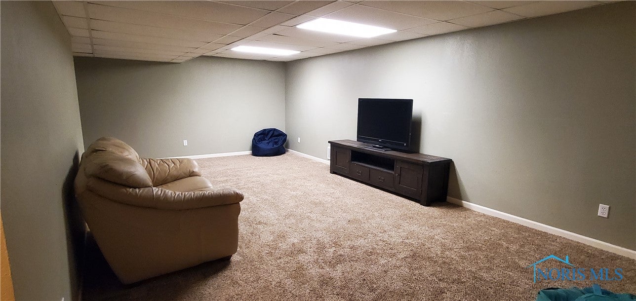 760 Weatherstone Road Holland, OH 43528 - Photo 36 of 44 Finished lower level, newer carpeting
